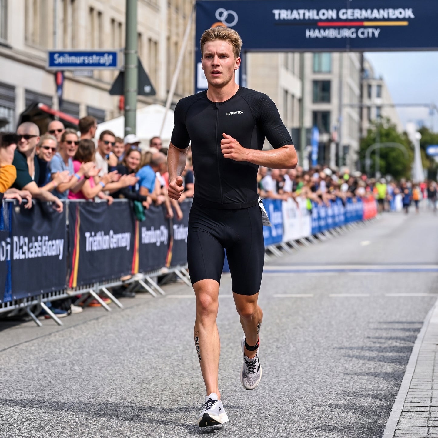 Men's Race Short Sleeve Trisuit - Kona Black - On course